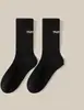 Calcetines de otoño e invierno hasta la pantorrilla Zhuji para hombre, desodorantes, absorbentes de sudor, transpirables, calcetines deportivos de caña alta, calcetines de moda para hombre y mujer, para todo