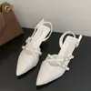 Sandalias de tacón alto negras, abiertas, con diseño calado, estilo metálico, a la moda y versátiles, nueva colección de verano 2026, con un diseño único y elegante