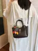 Elegante y estiloso bolso de mano tipo cesta Henggeng, nuevo modelo de moda versátil para uso casual, bolso de hombro y cruzado
