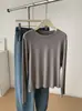 Camiseta básica de manga larga para mujer con bordado de encaje y capullos, nueva camiseta informal de color liso para primavera y otoño con cuello redondo, estilo coreano versátil