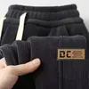 Calça de veludo cotelê transfronteiriça para homens, novo estilo primavera e outono, corte solto, tamanho grande, calça casual esportiva estilo jogger para homens