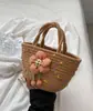 Bolso bandolera portátil de cuerda de algodón tejido para mujer, nuevo estilo fresco de color liso para primavera y verano, bolso de mano para vacaciones, bolso de mano para mujer, flor