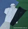 Traje de Otoño e Invierno 2025 Nuevo Pantalones de Seda Helada de Secado Rápido Chaqueta Deportiva Casual con Cremallera y Capucha Ropa de Protección Solar para Hombres y Mujeres Tendencia