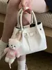2026 Nuevo Estilo Coreano Moda Versátil Exquisito Bolso Tejido a Mano Casual Simple Bolso Cruzado de Gama Alta Bolso Cubo