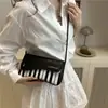 Bolso Versátil para Mujer 2025, Bolso Cuadrado Pequeño de Moda y Aspecto de Alta Calidad, Nuevo Bolso Bandolera de un Solo Hombro, Bolso para Mujer con Rayas Contrastantes Estilo Teclas de Piano