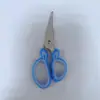 Venta al por mayor del fabricante Tijeras creativas multifuncionales hechas a mano para estudiantes Tijeras de plástico para niños Tijeras de seguridad para el hogar Tijeras de oficina