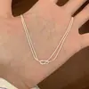 Collar de Cadena Hueso de Serpiente Anudado de Doble Capa para Mujer, Nuevo Modelo 2025, Diseño de Nicho de Lujo de Alta Gama, Accesorio Versátil con un Ambiente Elegante