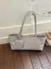 Moda minimalista coreana y japonesa 2026 verano nuevo para mujer de alta gama versátil para ir al trabajo nicho bolso de mano de un solo hombro bolso tote