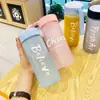Taza de agua de plástico al por mayor botella de agua deportiva taza de agua alto valor gran capacidad hombres y mujeres taza de agua de celebridad de internet taza portátil para estudiantes