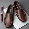 Zapatos de frijol estilo popular de transmisión en vivo transfronteriza zapatos perezosos para conducir de talla grande zapatos casuales británicos nuevos zapatos de verano para hombre