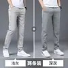 Nuevos pantalones casuales de otoño para hombre, seda de hielo, versátiles, corte recto, holgados, modernos, de secado rápido, pantalones largos deportivos para hombre