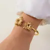 Pulsera de Acero Inoxidable con Presión de Aceite Serie Nueva Flor Europea y Americana Diseño de Moda Apertura de Flor Pequeña Pulsera Ajustable