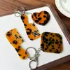 Peine espejo en forma de corazón, colgante de peine de acetato, accesorio de bolso simple y versátil, peine portátil con mango, llavero