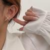 Diseño aretes populares nicho femenino aretes en forma de X femenino primavera y verano nuevo diseño de moda aretes de temperamento ins femenino