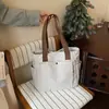 Bolso de lona versátil transfronterizo para mujer, nuevo bolso de hombro simple de moda 2026, bolso tote de gran capacidad para estudiante y persona que va al trabajo