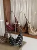 Bolso tipo empanada retro de nicho transfronterizo, nuevo bolso cruzado de moda para mujer Otoño 2026 con lunares, bolso de hombro para el trabajo