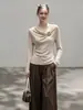 Otoño 2026 Nuevo Minimalista Francés Adelgazante Hebilla Metálica Cuello de Gireo Retorcido Ajustado Manga Larga Top de Punto Mujer 192
