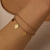 Pulsera de Acero Inoxidable con Colgante de Flor de Venta Caliente Transfronteriza Europea y Americana de Acero Titanio con Conservación de Color Cinco Flor de Cuatro Hojas Pulsera de Doble Capa para Mujer