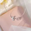 Collar Inalterable Color Acero Titanio Lujo Ligero Diseño de Nicho Gama Alta Versátil Cadena para Clavícula Adornos de Corazón y Mariposa para Mujer Venta al por Mayor