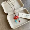 Collar trenzado de manzana color dopamina para mujer, lindo, largo, para colgar en el cuello, accesorios 2025, nuevo colgante, cadena para suéter