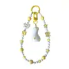 Colgante de pato de moda con lazo, cuentas de queso, llavero, correa para teléfono, accesorio para bolso, accesorio de bricolaje, regalo
