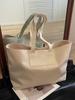 Bolsa Tote Casual Simples para Mulheres 2026 Nova Versátil de Grande Capacidade Bolsa para o Dia a Dia Moda de Nicho Bolsa de Ombro