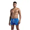 Novos shorts de fitness de verão estilo europeu e americano para homens, confortáveis, respiráveis, cor sólida, adequados para corrida, esportes casuais e treinamento
