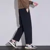 Pantalones casuales versátiles para hombre, pantalones deportivos holgados de otoño, nuevos pantalones cropped de color liso, pantalones de pierna recta que realzan la altura