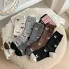 Calcetines de lana gruesos y cálidos nuevos para mujer de otoño e invierno, calcetines lindos de perro estilo coreano de moda de media pantorrilla, calcetines holgados