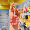 Llavero de coche con borla de cuentas electrochapadas, colgante para teléfono móvil, anillo de pintura de color caramelo lindo, accesorios de perlas, bolsa