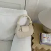 Bolso de Mano Tejido de Moda 2026 Modelo Nuevo Bolso de Media Luna Elegante de Alto Valor Estilo Coreano Bolso Cruzado de Hombro de Nicho