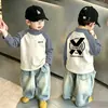 Camiseta Térmica de Polar para Niños Cuello Semi Alto Capa Base 2026 Otoño/Invierno Nuevo Bloque de Color Camiseta para Niños Moderna Versátil Top Moderno