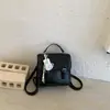 Mochila de Verano Nueva Transfronteriza 2026 Elegante Casual Estilo Universitario para Mujer Nicho Versátil para Viajes Cortos Mochila Pequeña de Alta Gama