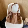 Bolsa de camurça casual retrô, nova coleção outono 2026, bolsa de ombro feminina para o dia a dia, bolsa de ombro moderna e de grande capacidade