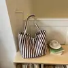 Bolsa de lona listrada da moda para mulheres 2026 novo modelo bolsa tote de grande capacidade bolsa de ombro casual para o dia a dia de grande capacidade
