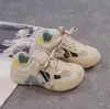 Tênis Esportivo Infantil 2026 Primavera e Outono Novo Estilo Sapatos Casuais de Solado Macio para Meninas Tênis de Corrida Respiráveis de Malha para Meninos