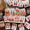 Pendientes de Clip de Resina Coloridos Lindos con Forma de Personaje de Dibujos Animados para Niñas, Accesorios de Pendientes de Lazo Corazón Explosivo