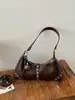 Bolso de axila de nicho estilo francés para mujer, nuevo bolso cruzado pequeño para teléfono móvil de moda primavera-verano 2026, bolso cruzado de hombro de alta gama