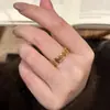 Anillo de Dinero de Rubí Chino Nuevo Vintage de Lujo Ligero Microincrustado Hueco Personalidad Estilo Nacional Exquisito Único Anillo Versátil