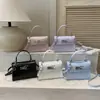 Otoño/Invierno 2026 Nuevo Elegante Textura de Moda Versátil Ligero de Lujo con Relieve de Cocodrilo Bolso Kelly de Hombro Cruzado de Mano