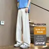 Pantalones rectos de color liso con caída y sensación de alta calidad, bolsillo curvo, pantalones casuales forrados de polar para hombre, otoño, pantalones casuales de traje extralargos