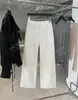 Recomendación PrincipalColección Nueva Primavera/Verano 26 de Yuran: Jeans de Algodón Orgánico Estructurados con Corte Dividido y Dobladillo Curvo hasta el Suelo
