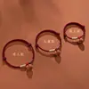 Pulseira de Fio Vermelho com Caroço de Pêssego Segura do Ano Zodiacal para Homens Mulheres Bebês Crianças Amuleto Tecido para Afastar Assustador Velho Madeira de Pêssego Fio de Mão