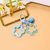 Pingente requintado e novo de estrela de cinco pontas dupla, um chaveiro doce e feminino, perfeito como acessório para casais ou melhores amigos para bolsas, e uma decoração DIY