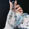 Cadena para Teléfono Móvil de Cuatro Hojas de Circonita Colgante de Flor Cadena para Teléfono Móvil con Cuentas de Cristal Correa Dulce para Muñeca del Teléfono Móvil Venta al por Mayor