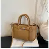 Bolsa de design de nicho de alta qualidade bolsa feminina 2026 nova bolsa de mão estilosa bolsa de balde versátil bolsa de ombro único transversal
