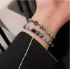 Pulsera Cruzada de Piedra Biliar Negra Estilo Frío Oscuro para Hombres Pulsera de Alto Nivel Pulsera de Diseño de Nicho Hip-Hop de Moda para Mujeres