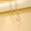 Collar Clavícula Retro Francés de Imitación Perla con Borla de Corazón de Tres Capas Apilable Europeo y Americano Nicho Temperamento de Gama Alta para Mujeres