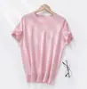 Nueva Camiseta de Lana Fina Color Sólido Estilo Minimalista Versátil Holgada Manga Corta Tejida Cuello Redondo para Mujer Delgada Primavera/Verano 2026