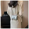 Bolso de cadena acolchado estilo Chanel para mujer, nuevo bolso cruzado mini de moda versátil 2026, bolso cuadrado pequeño popular